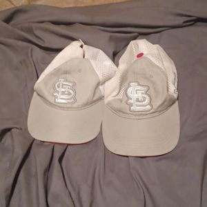 Two St Louis Cardinals hats